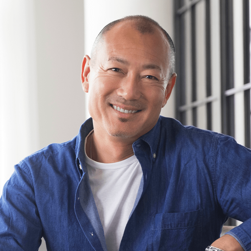 Adult man in blue button down shirt