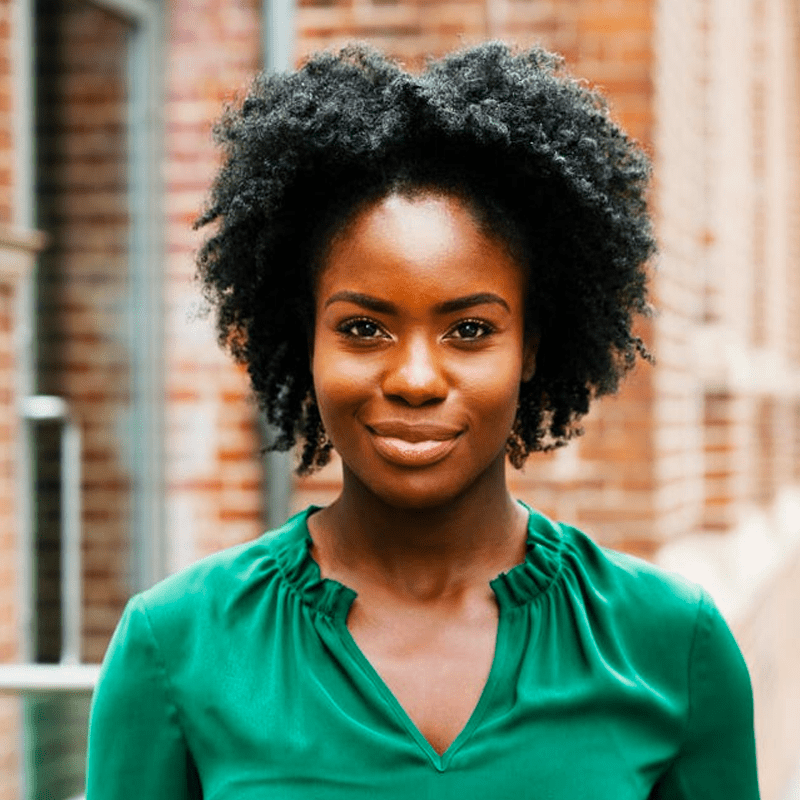 Adult woman in green shirt