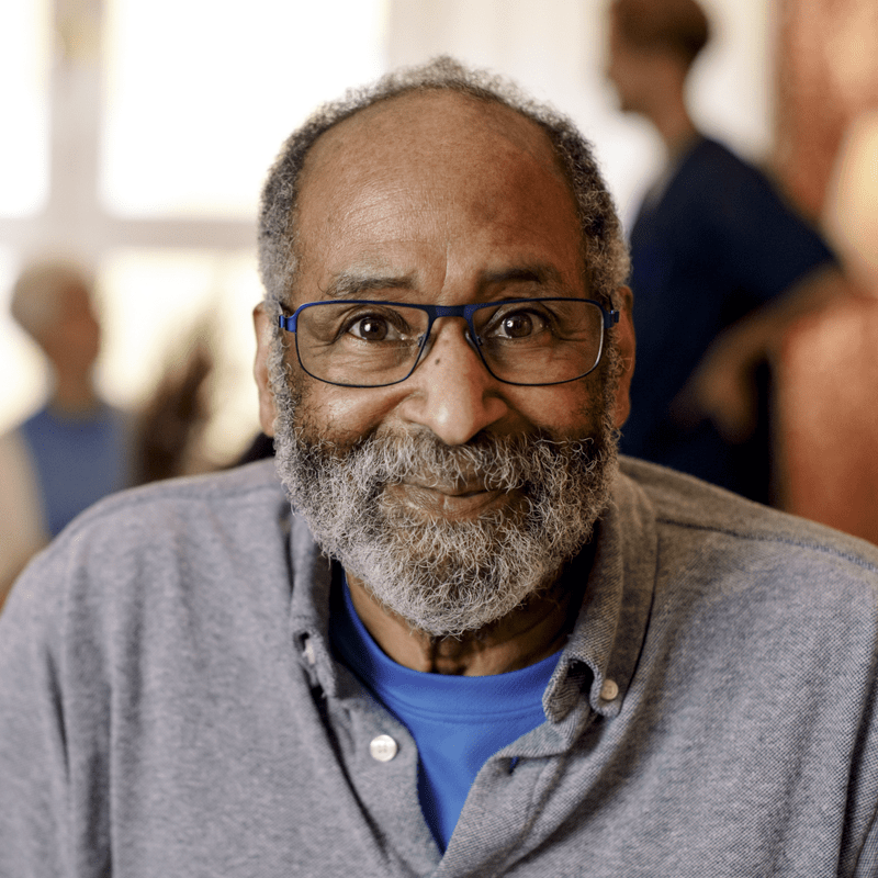 Older man in gray shirt