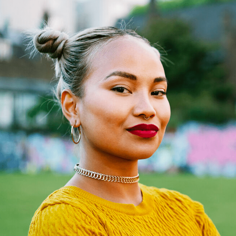 Woman in yellow sweater